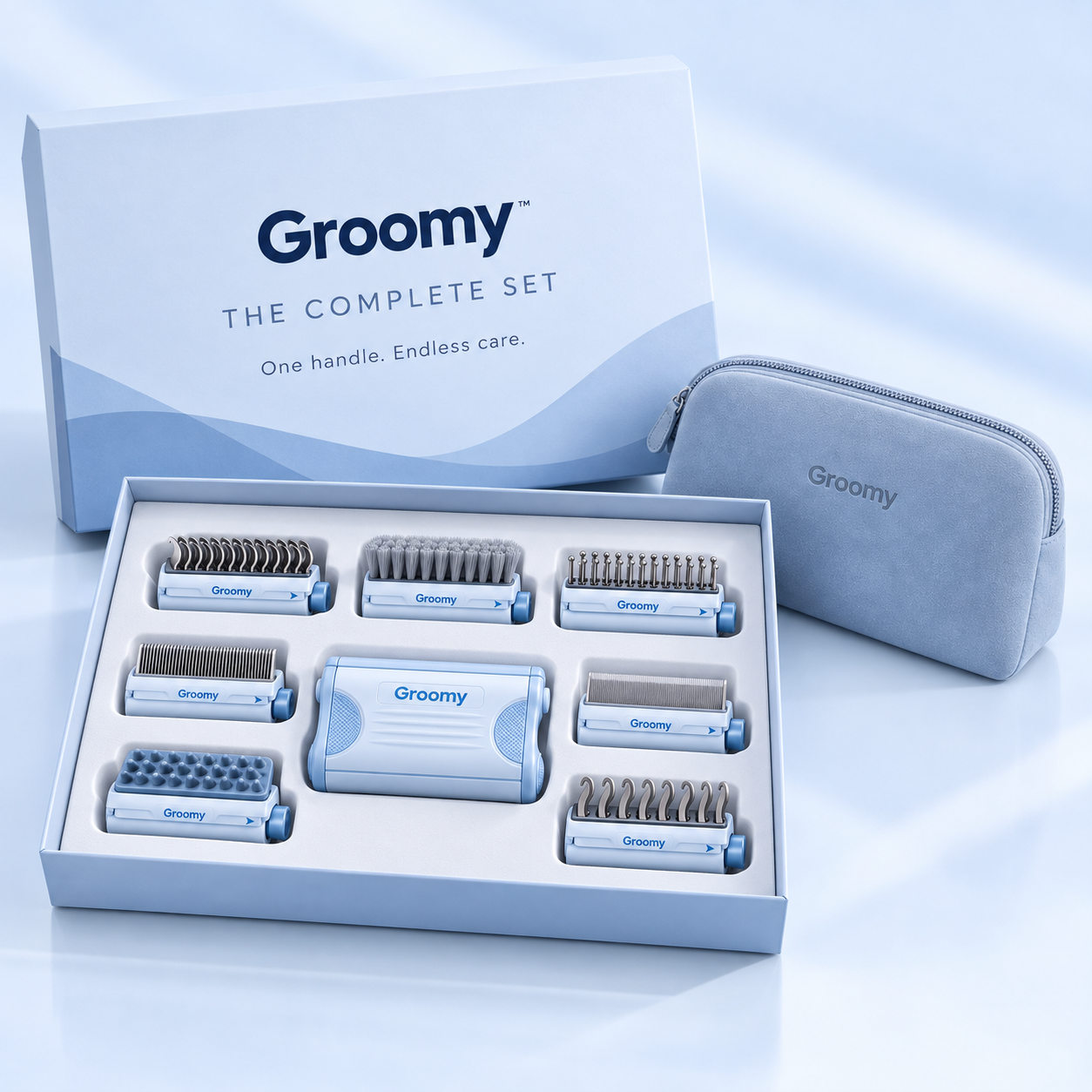 The Complete Groomy Set gift box with the handle, seven heads and suede pouch.